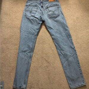 Levi’s 502 Faded Jeans